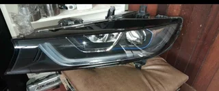 Bmw i8 left headlight available for sale.