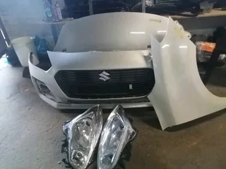 Suzuki swift bumber, bonnet, fender, and headlight for sale