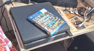 PlayStation 4 (Slim) 500GB &amp; Accessories