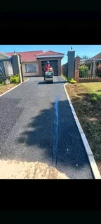 TAR  SURFACING   AND   DRIVEWAYS