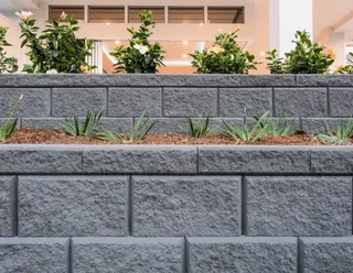 Retainers and breeze blocks