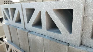Retainers and breeze blocks