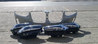BMW X3 GO1 HEADLIGHTS AND BUMPER