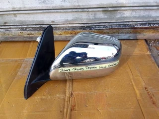 (2003-2009) TOYOTA LAND CRUSER LEFT SIDE MIRROR FOR SALE .IN GOOD CONDITIN