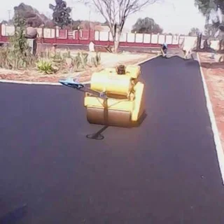 Tar roadways and backyards