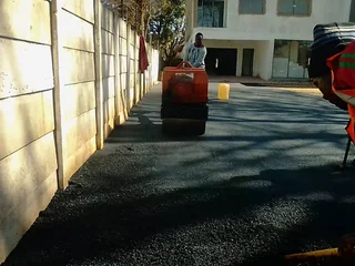 Tar roadways and backyards