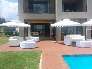 Marquee tent hire with plastic chairs and tables. Artificial green carpet. Full decor set up.