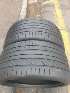 2x 295 35 21 Continental tyres with good treads available for sale