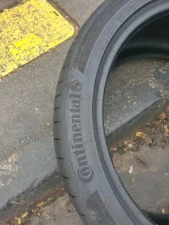 2x 295 35 21 Continental tyres with good treads available for sale