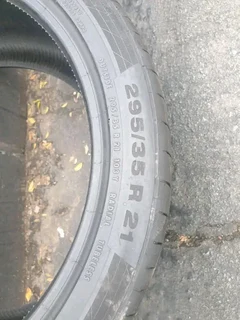 2x 295 35 21 Continental tyres with good treads available for sale