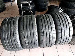 A clean set of 295 35 21 Two Bridgestone and Two Goodyear tyres with 98% treads available for sale