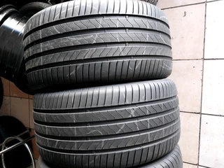 A clean set of 295 35 21 Two Bridgestone and Two Goodyear tyres with 98% treads available for sale