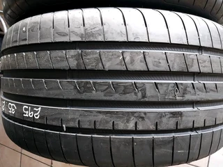 A clean set of 295 35 21 Two Bridgestone and Two Goodyear tyres with 98% treads available for sale