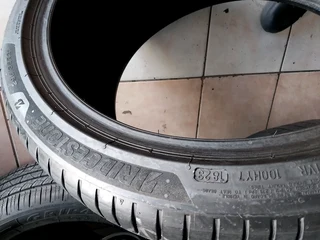 2x 295 35 21 Bridgestone tyres with 98% treads available for sale