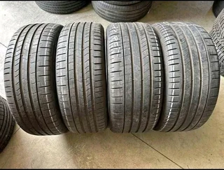 A clean set of 275 40 20 and 245 45 20 pirelli p zero run flat tyres with good treads available for