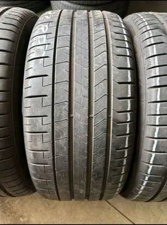 A clean set of 275 40 20 and 245 45 20 pirelli p zero run flat tyres with good treads available for