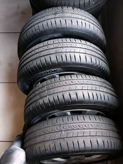 A clean set of 14inch polo steel rims tyres and wheel covers available for sale