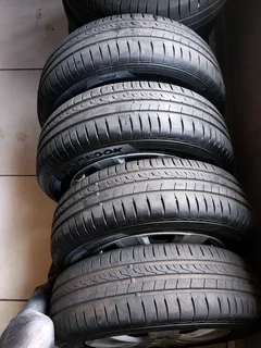 A clean set of 14inch polo steel rims tyres and wheel covers available for sale
