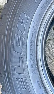 A clean set of 265 65 17 Bridgestone dueler tyres with good treads available for sale
