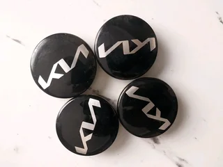 A set of kia center caps available for sale