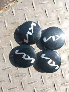 A set of kia center caps available for sale