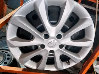 A new set of Toyota brand new steel rims and wheel covers pcd 5/114.3 available