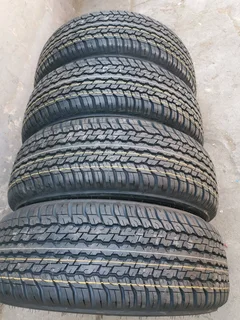 New 4x 265/60/18 Dunlop Grandtrex AT25