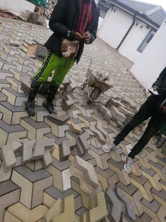 Paving Bricks and Tarring