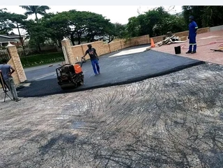 Paving Bricks and Tarring