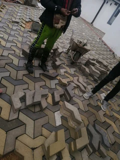 Paving Bricks and Tarring