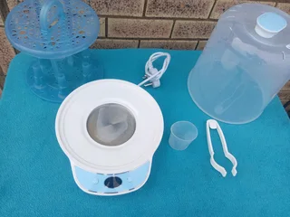 SNOOKUMS ELECTRIC STEAM STERILIZER