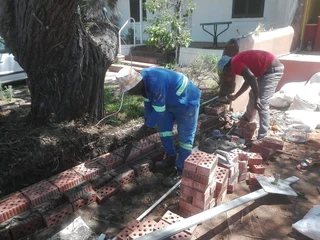 Skilled brick layer and plasterer