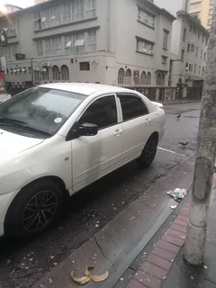 White Toyota Corolla kokoroshe start and go