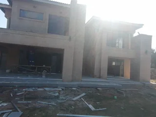 Floor and wall tilling with skirting at R150 per square meter full tilling