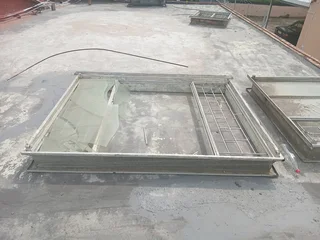 Window frame with burglar guard