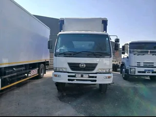 Nissan UD90 Tag-Axle Curtain-Side TruckLooking for a reliable workhorse?