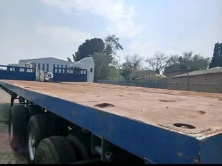Attention-Grabbing 2003 Triaxle Flatdeck Trailer!Your Investment: R195,000 Excluding VAT*