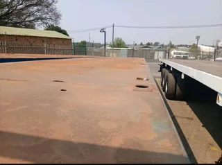 Attention-Grabbing 2003 Triaxle Flatdeck Trailer!Your Investment: R195,000 Excluding VAT*