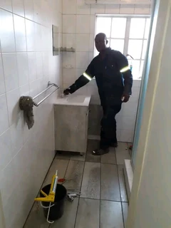 Tiler and bathroom  champion