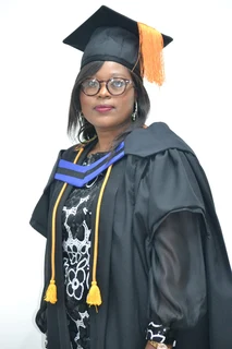 Graduation gowns, belts and caps