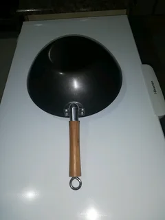 Wok round bottomed cooking pan
