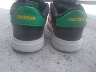 Size 8 and a half unisex Adida Toddler Sneaker