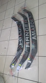 Bonnet cover for Ford Ranger,  Hilux, and Amarok. leave your whatsapp number if interested.