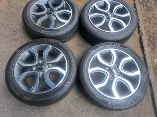 15 Inch Kia Mags with 185/55R15 tires.Delivery/Courier can be arrange for extra cost,