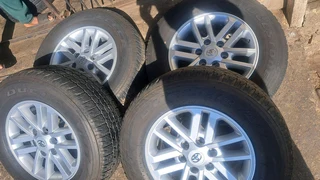 17 inch toyota mags with 265 65 r17 bridestone tires, leave us your whatsapp number if interested.
