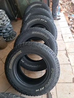 A set of 265 65 r17 Hankook tires for sale. leave your whatsapp number if interested.
