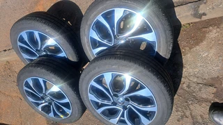 16 inch Toyota Mags of 4x100 pcd with tires. Leave your whatsapp number if interested.