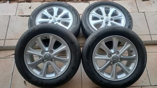 14 inch Hyundai i10 mags with 165/65R14 tires, leave your whatsapp number if interested.
