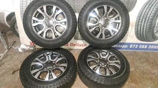 265/60R18 Ford Mags with General Grabber tires, leave your whatsapp number if interested.