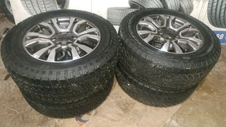 265/60R18 Ford Mags with General Grabber tires, leave your whatsapp number if interested.